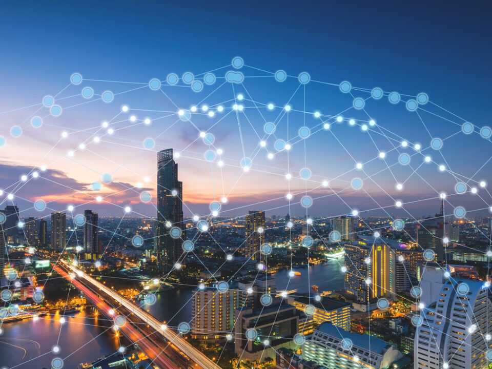 Data points hover over a city skyline representing a decision-making framework for municipal asset management.