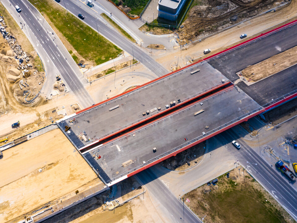 An unfinished highway still under construction, a metaphor for infrastructure asset management and capital planning.