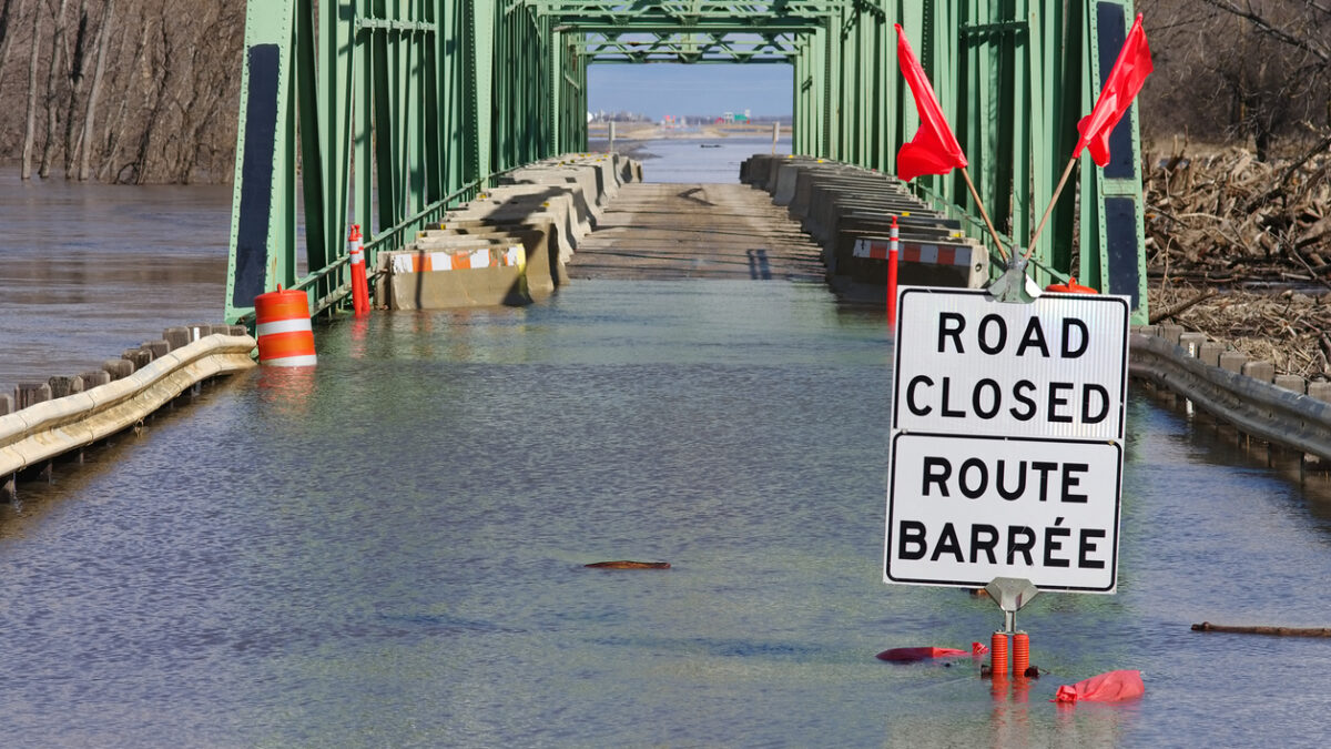 Flooded road that could have been prevented with climate-resilient infrastructure.