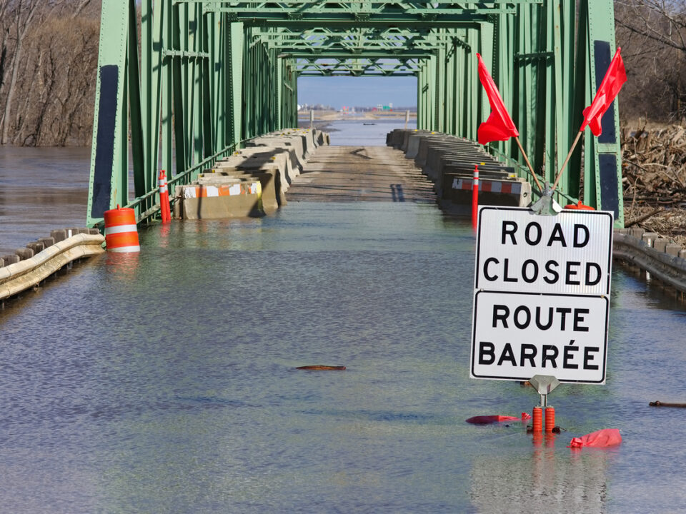 Flooded road that could have been prevented with climate-resilient infrastructure.